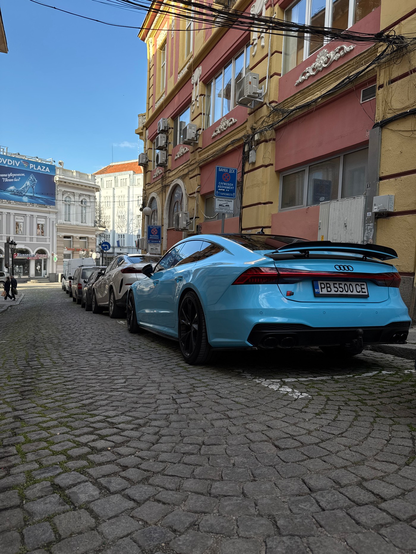 Street musician, candy shop visits, cat encounters captured in Plovdiv