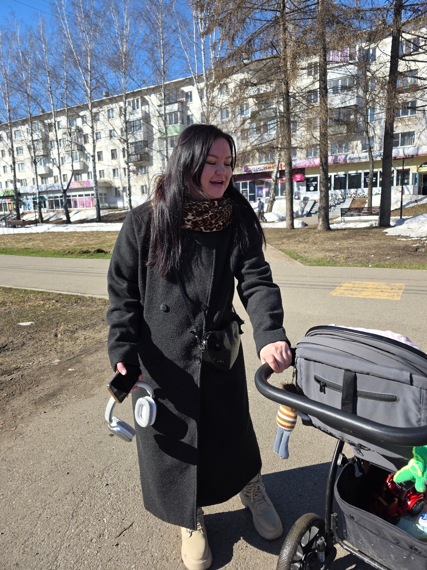 Mother and toddler enjoy early morning playground visit in Chaikovsky