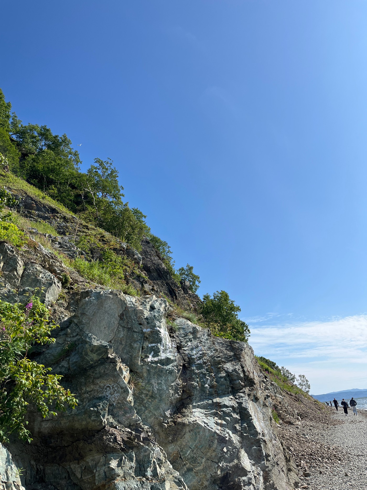 Clear summer day on Kamchatka's rocky Pacific shoreline