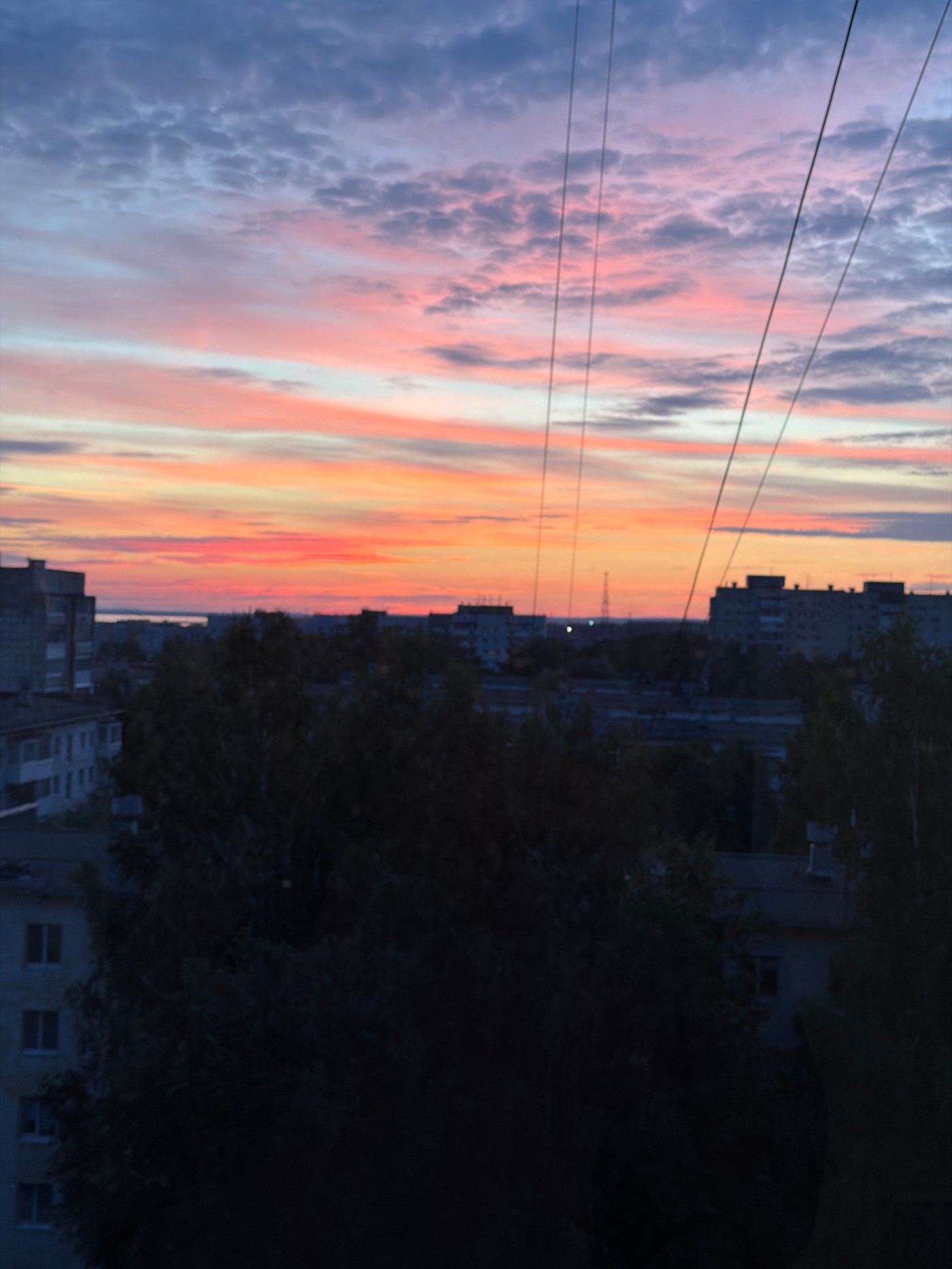 Vivid sunset over Chaikovsky photographed from multiple angles