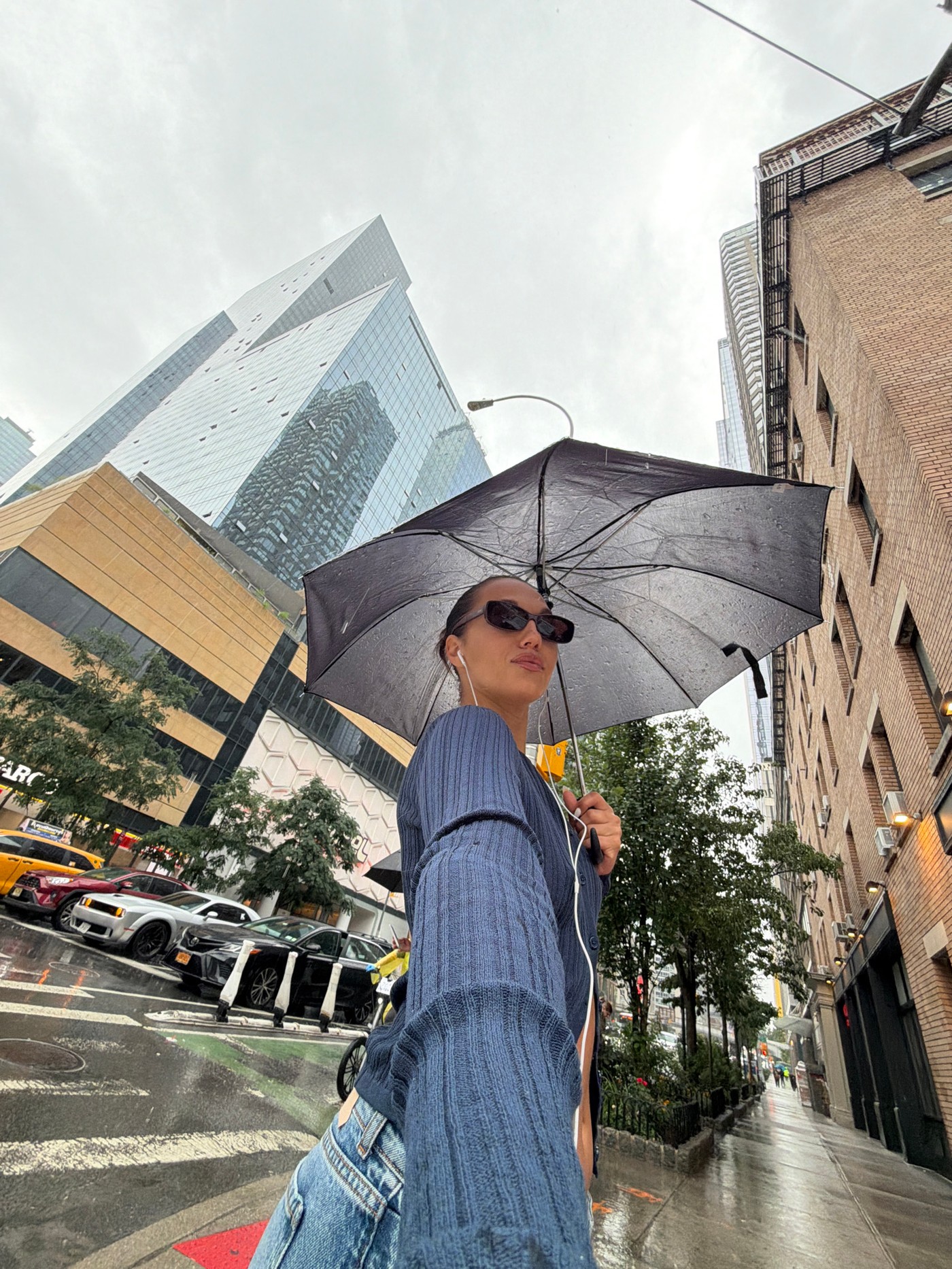 Under the Umbrella: A Rainy Afternoon in Midtown Manhattan