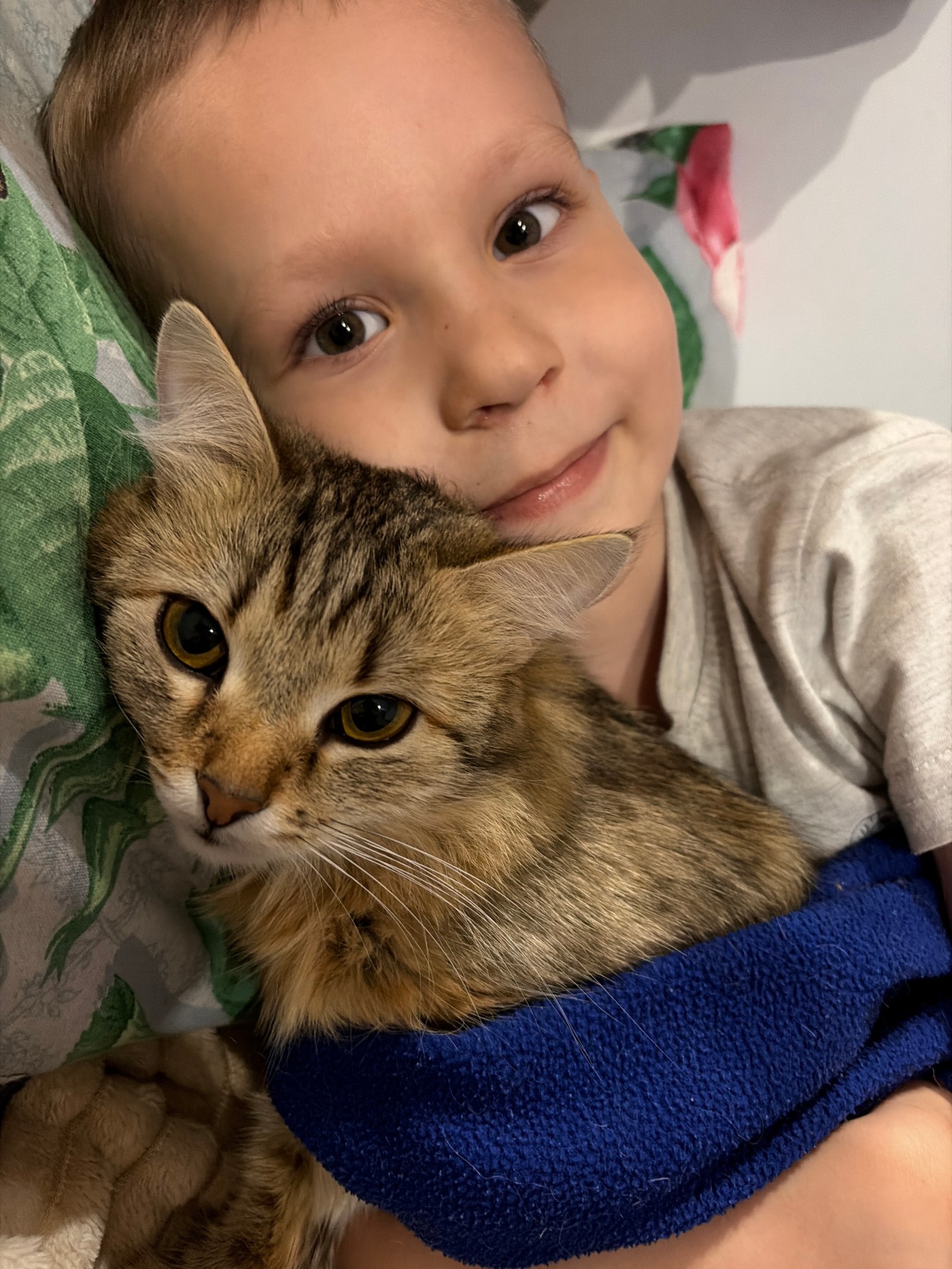 Witness captures quiet domestic moments with child, adult, pets
