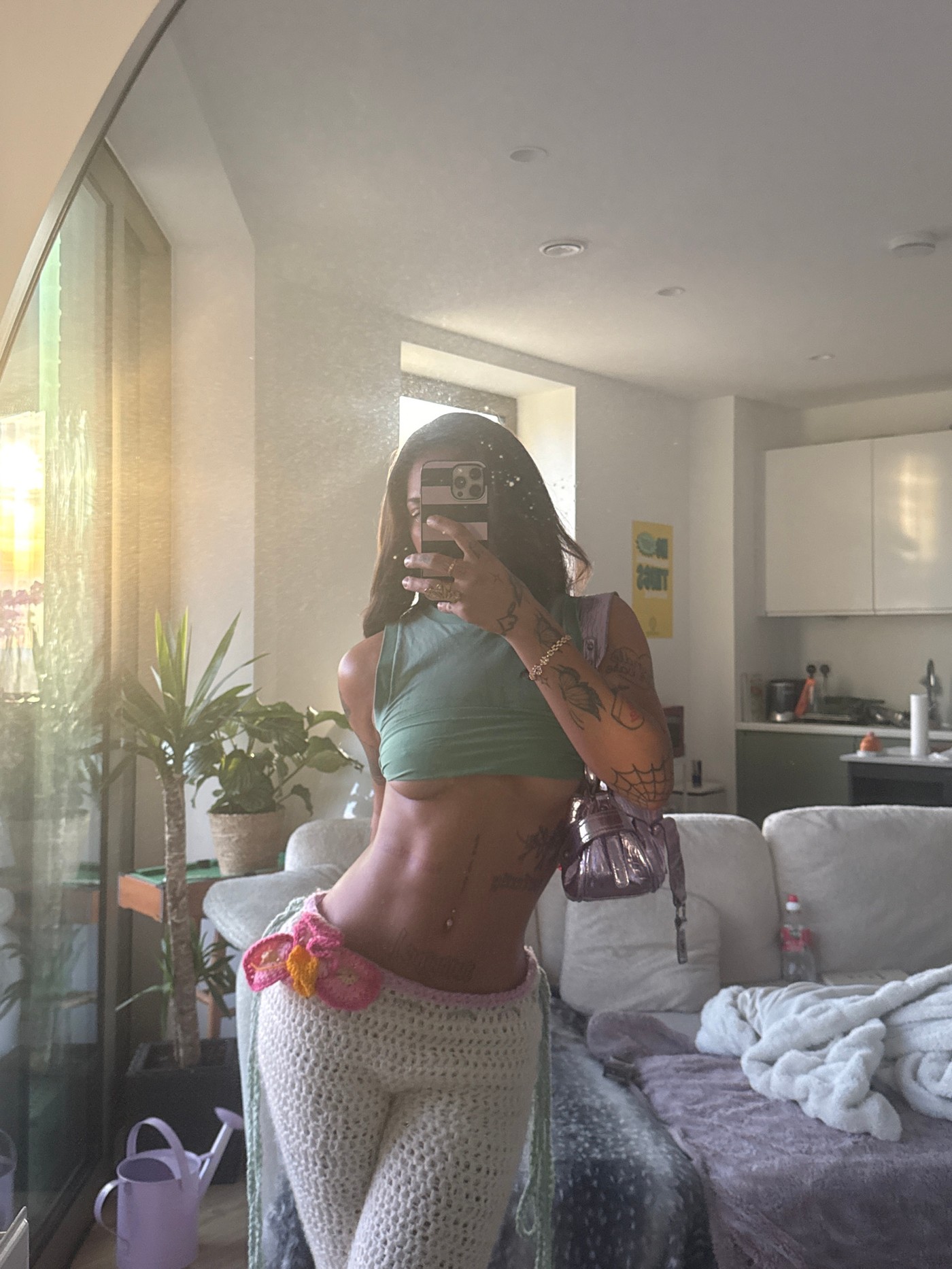 Woman takes mirror selfie in London apartment