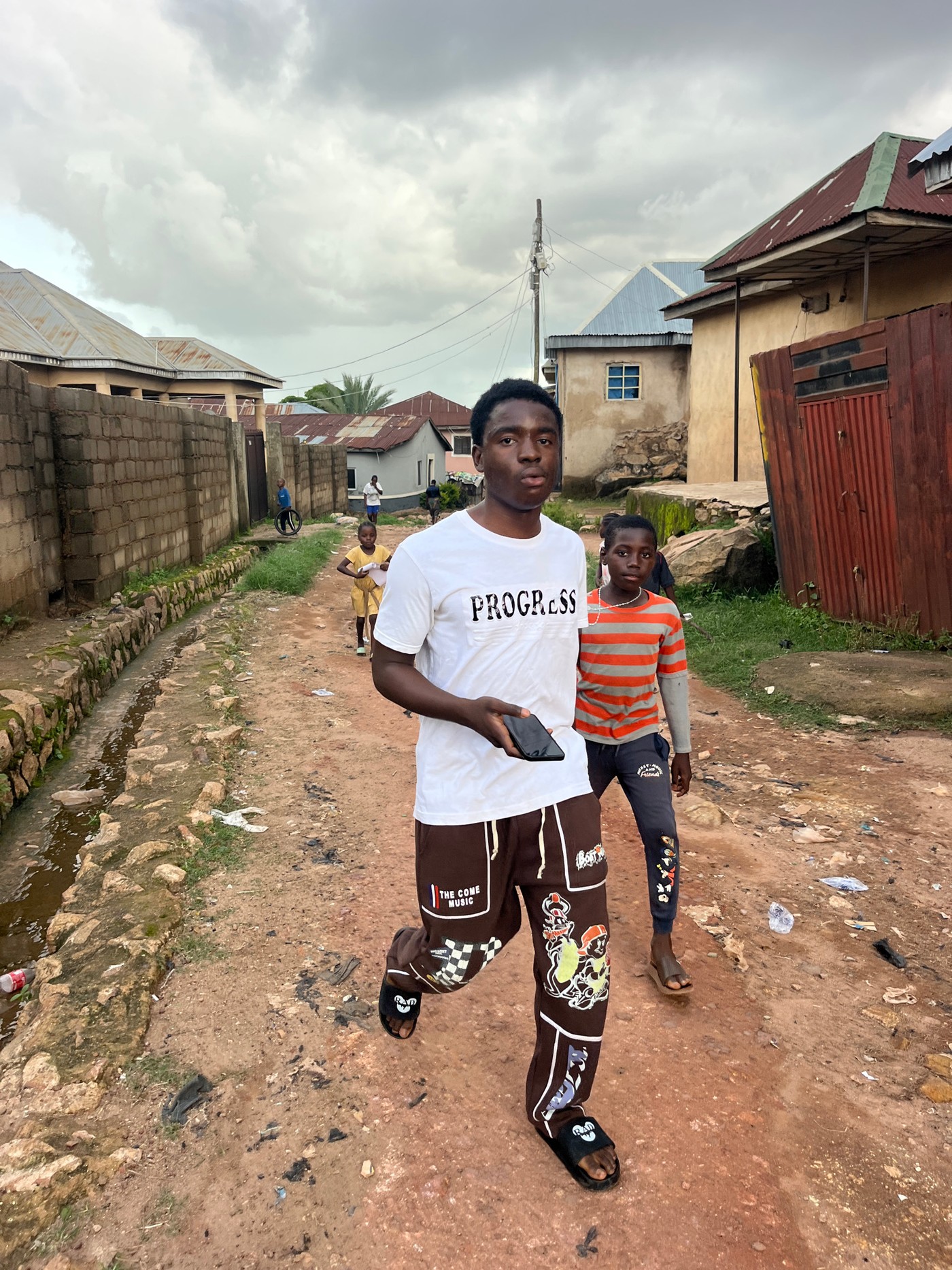 Everyday life in a semi-rural neighborhood under stormy skies