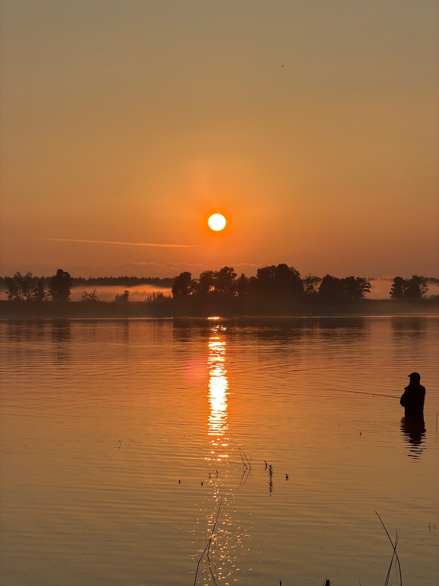 Evening fishing in calm waters near Chernushka