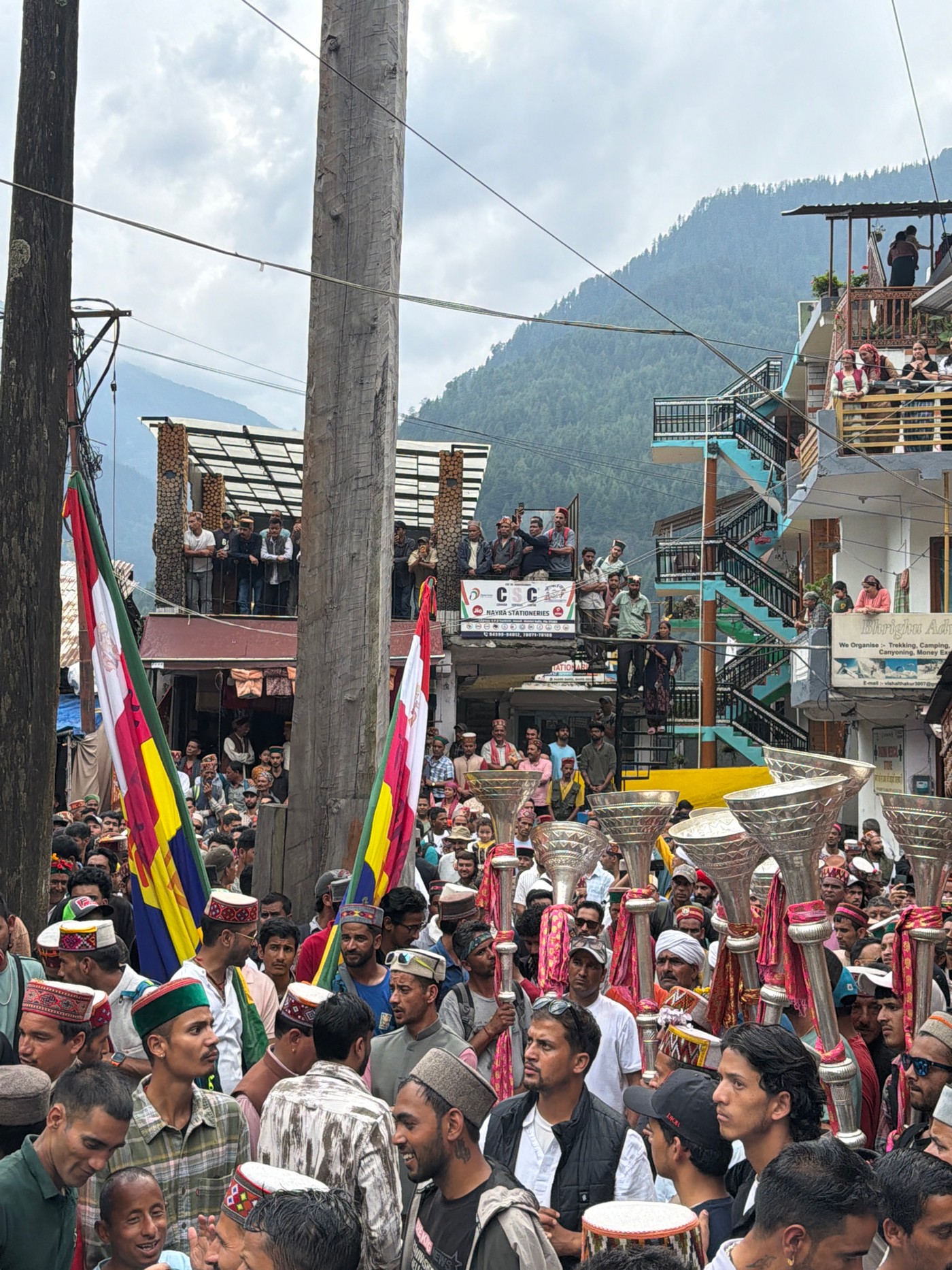 Religious procession winds through Vashisht with traditional music and crowds