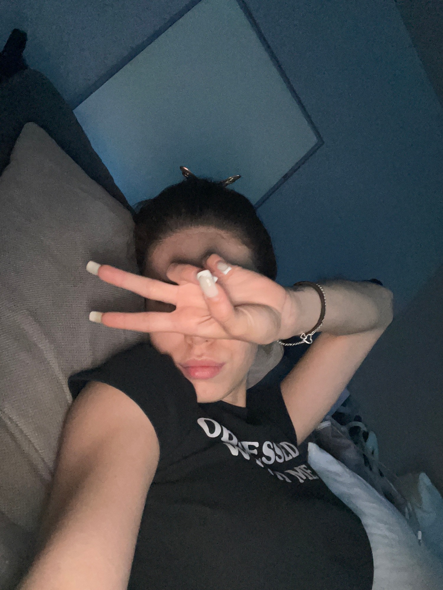Lazy evening selfie session with recurring tattoos and graphic tees