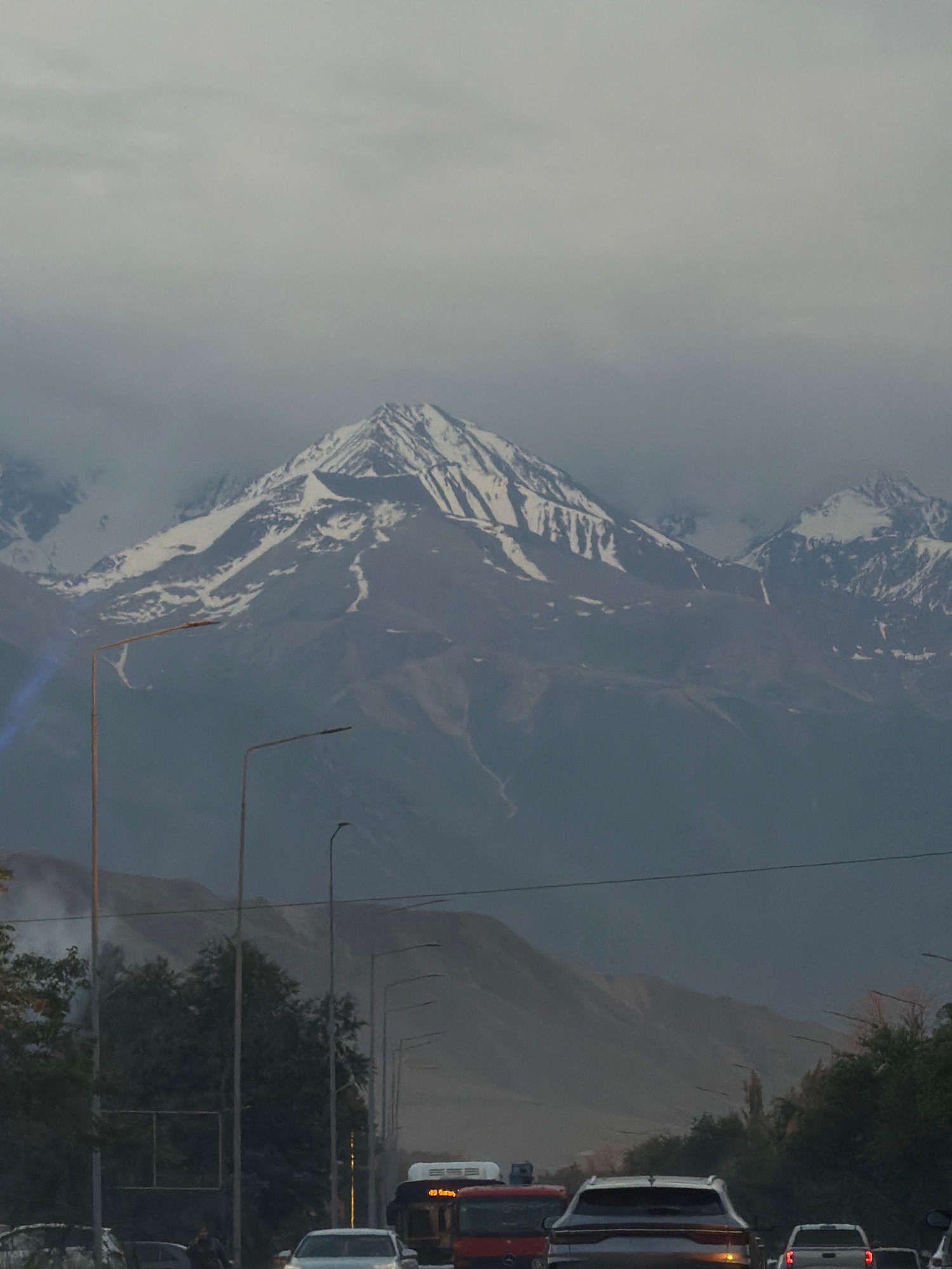 Daily urban life documented with mountain views, meals, traffic