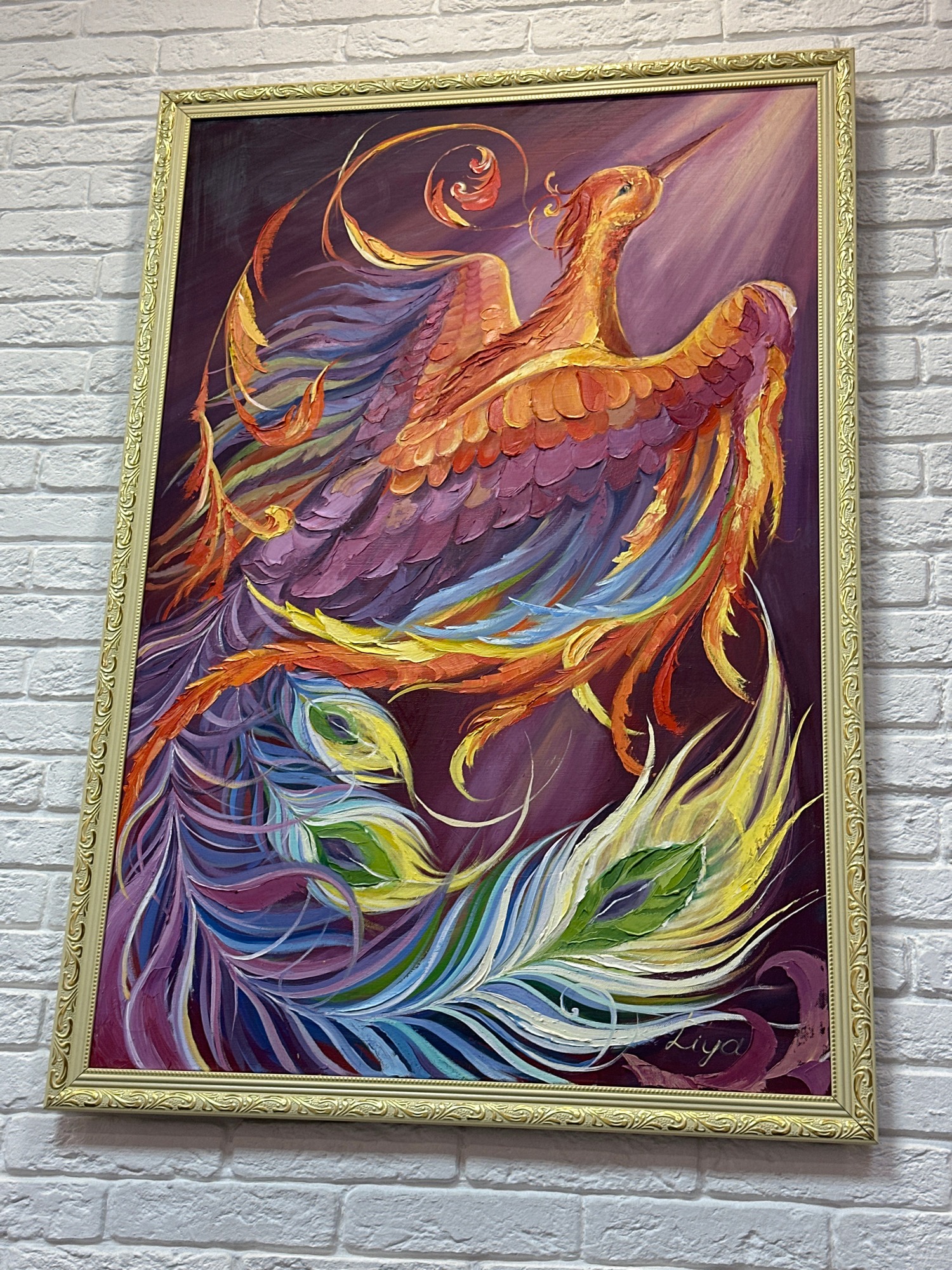 Feathered Rebirth: Leya’s Radiant Phoenix Paintings Illuminate the Gallery