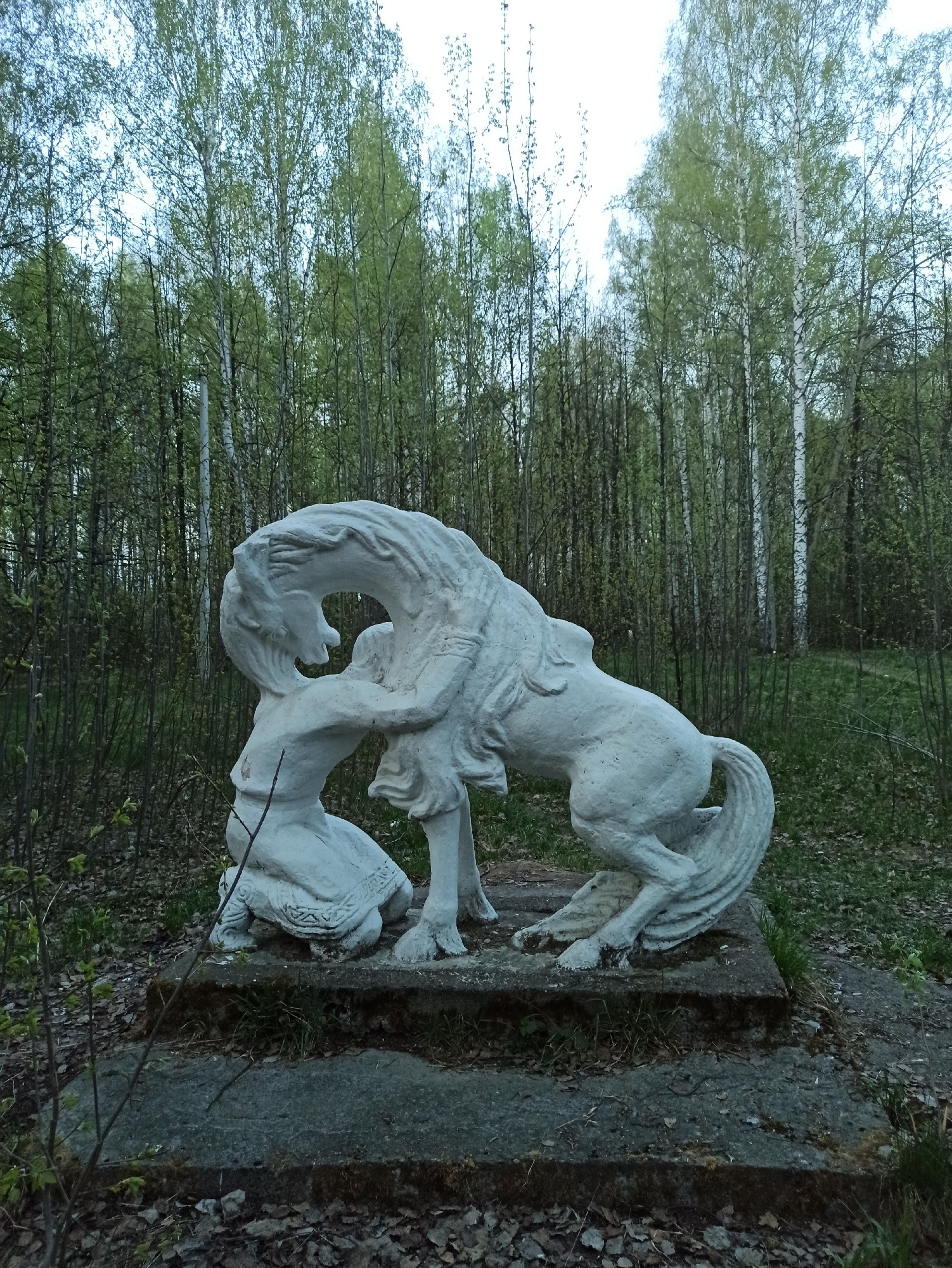 Walker spotted in birch forest near woman-horse statue