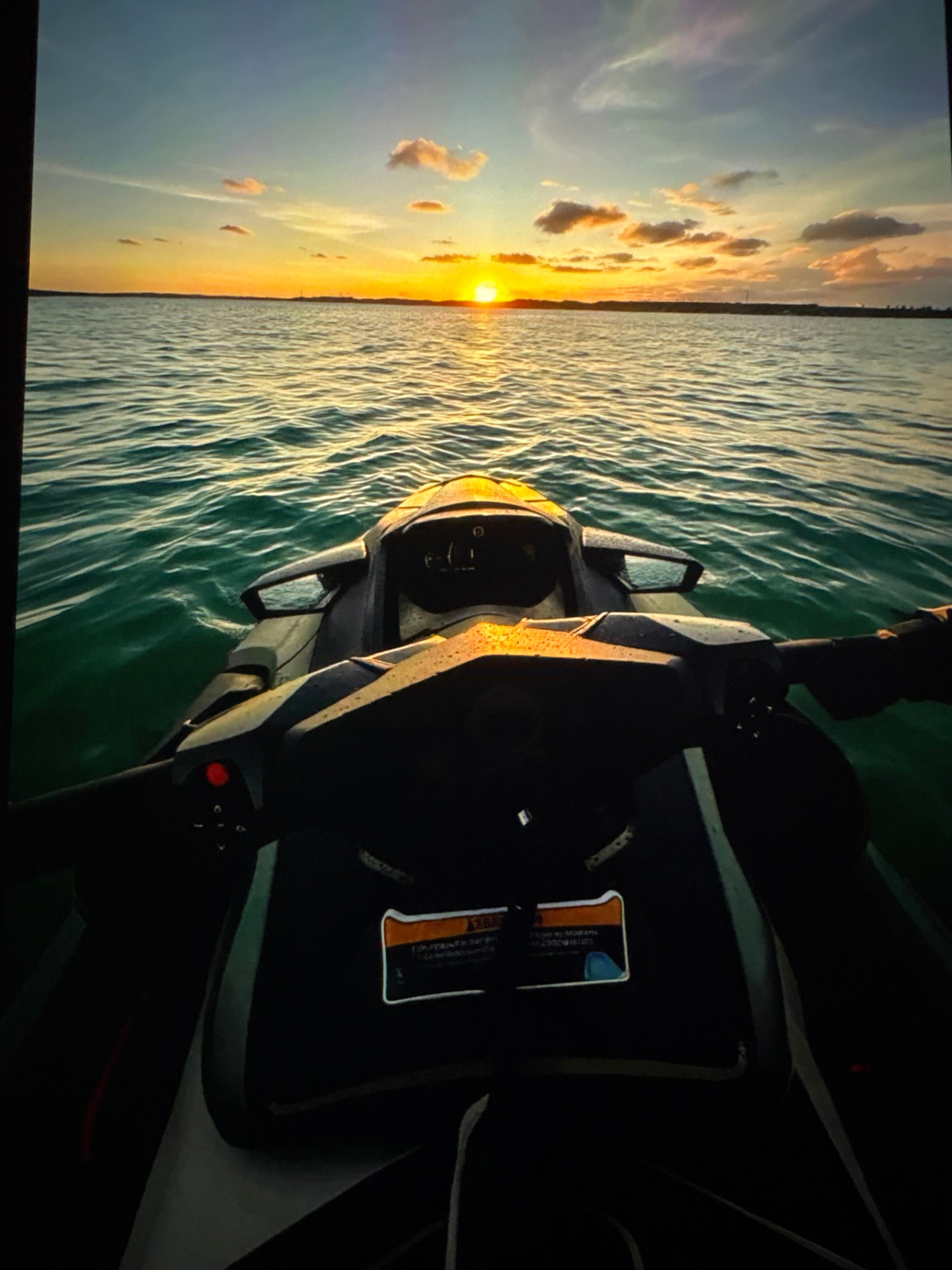 Sunset jet ski, Rio landmark, and a new iPad unboxing