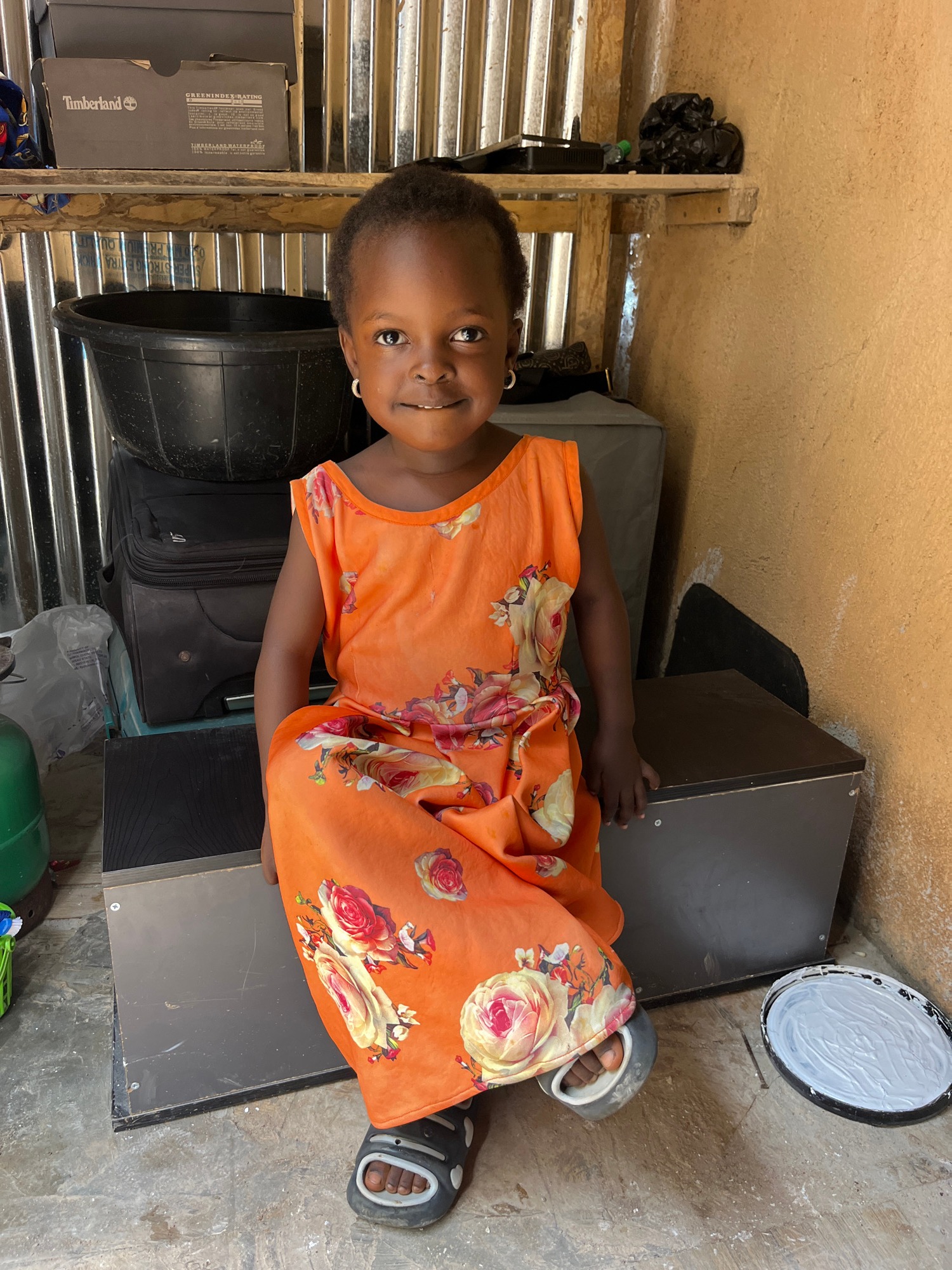 Everyday moments: kids, hair braiding, and a paint job
