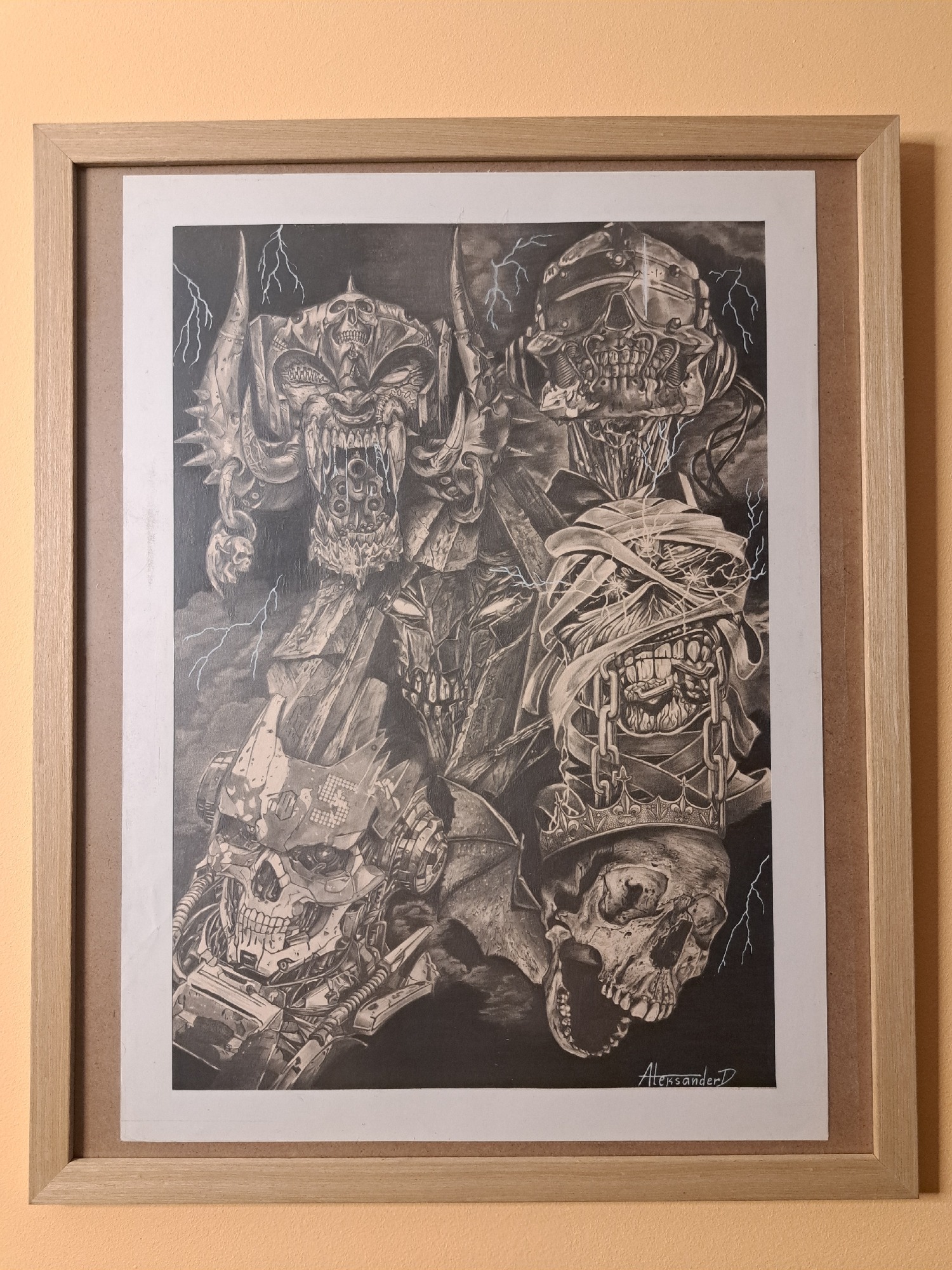 Framed monochromatic artwork observed on orange wall