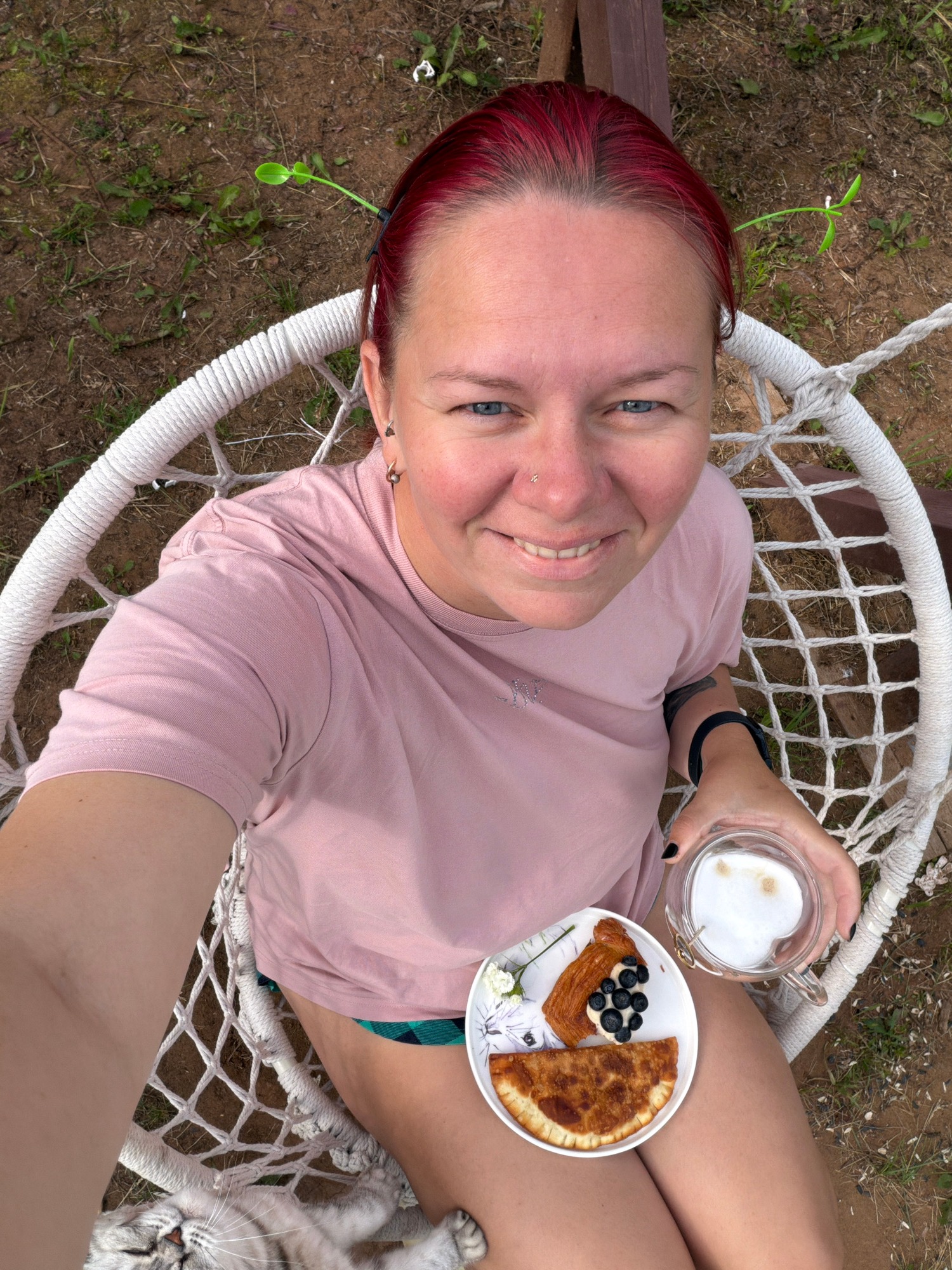 Lazy morning pastries, latte art, and a cat in the garden