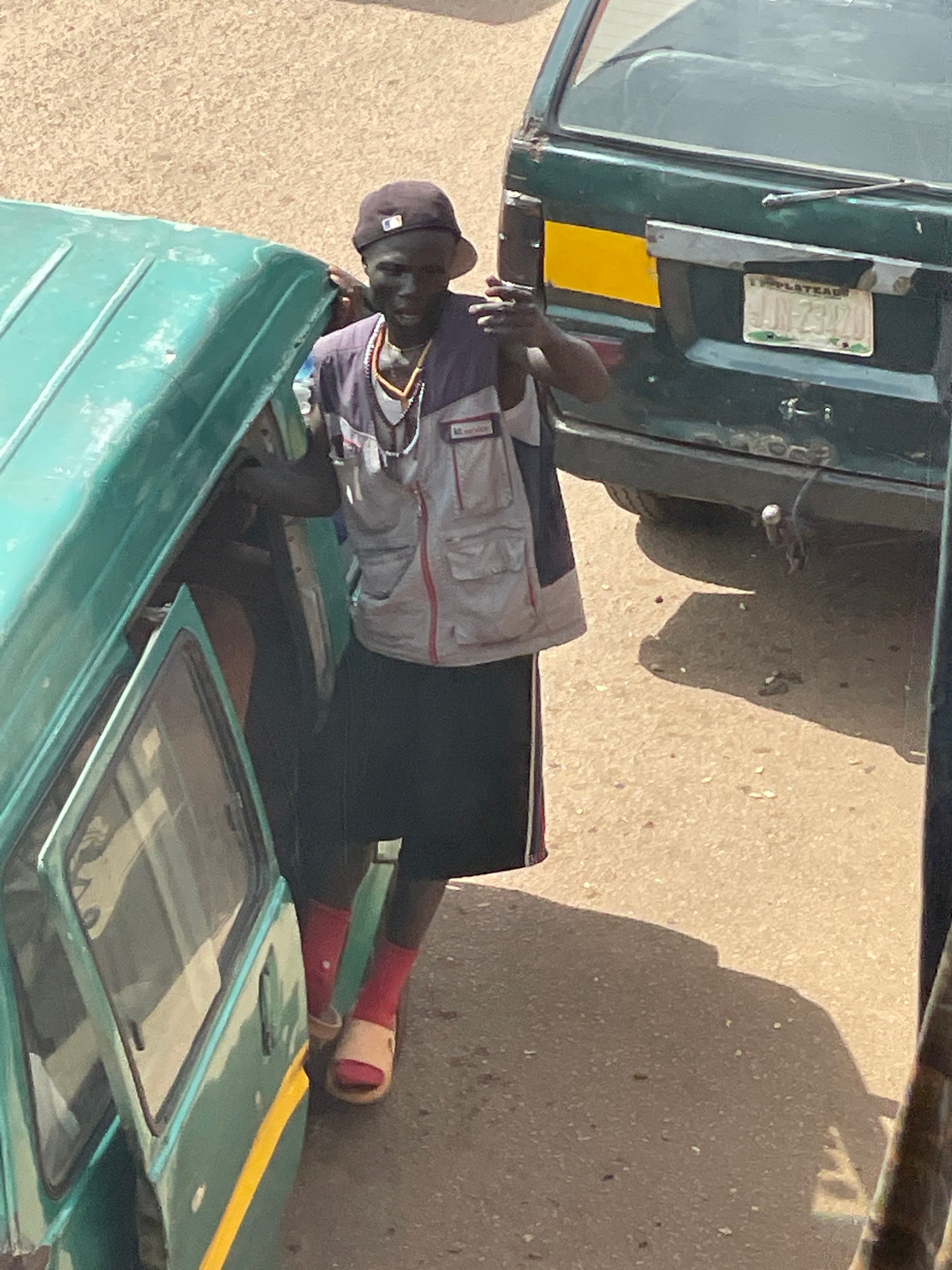 Everyday street life and commerce in a busy African urban setting