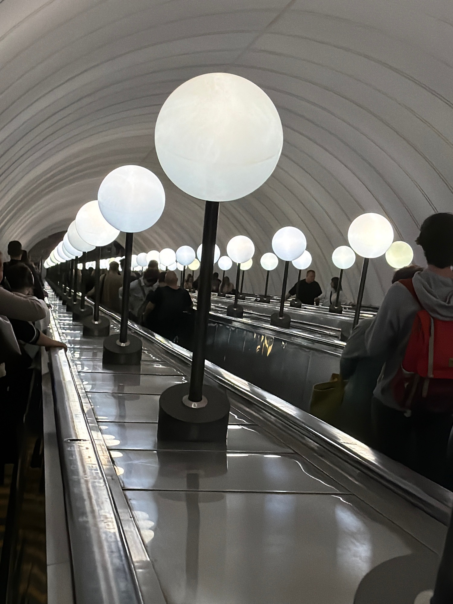 Everyday commuter scenes around a Moscow metro station