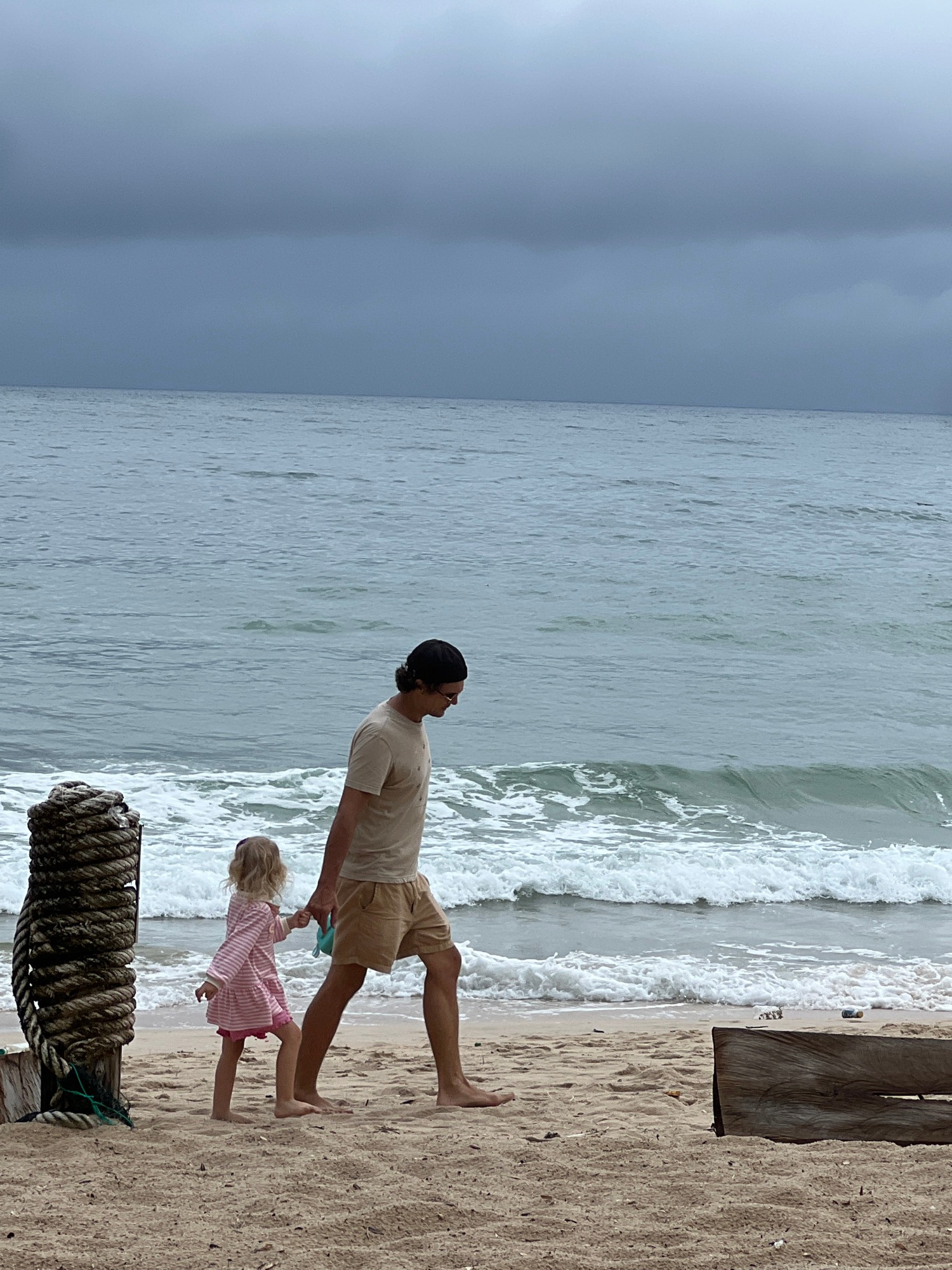 Laid-back tropical beach scene on a cloudy day