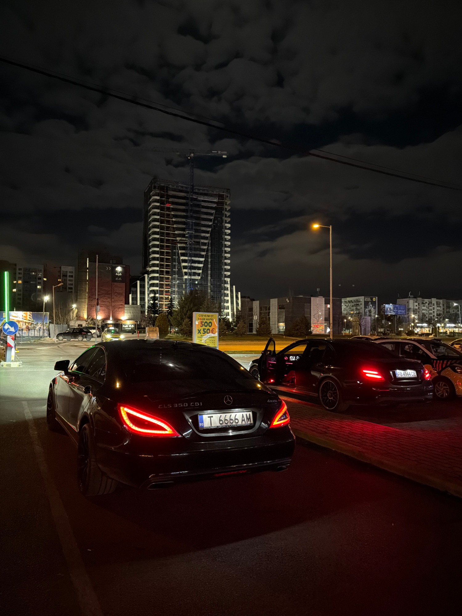 Global Nightlife: Luxury Cars and Late-Night Cityscapes