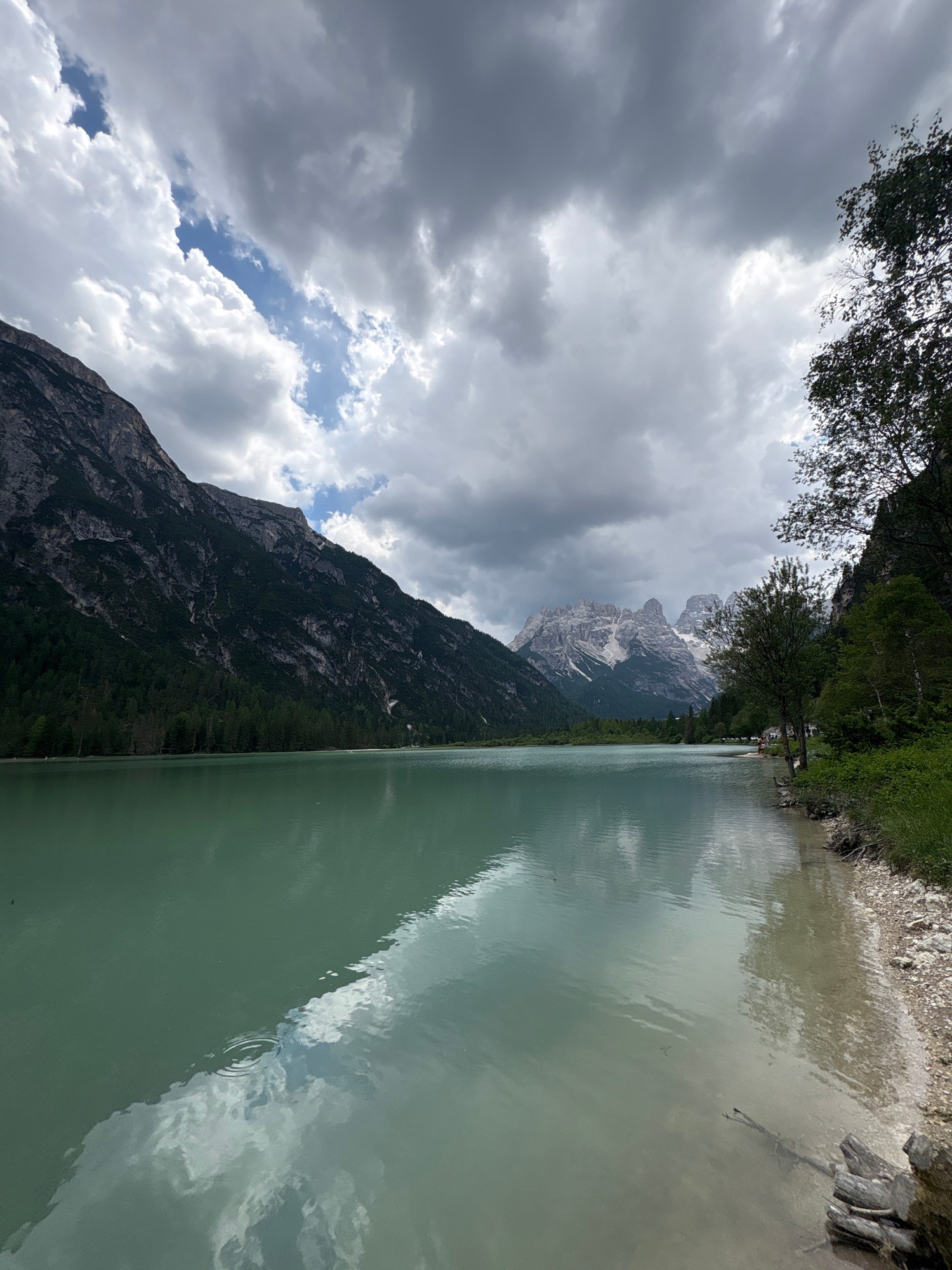 Hanging out at a scenic turquoise mountain lake on a cloudy day