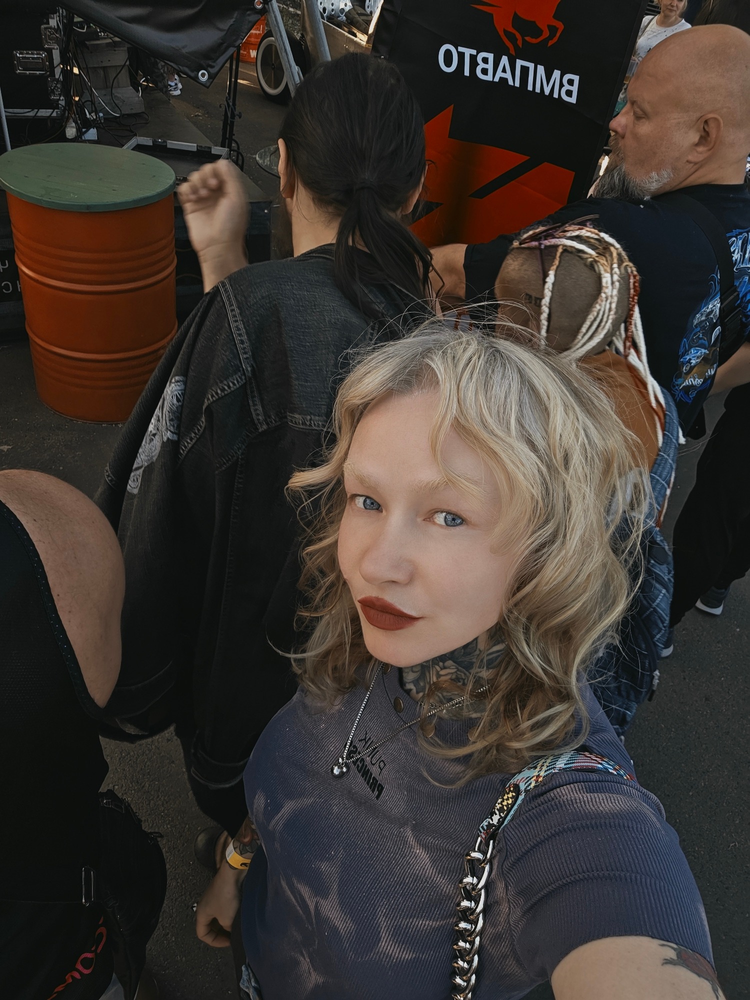 Live music and festive crowd at an outdoor summer event