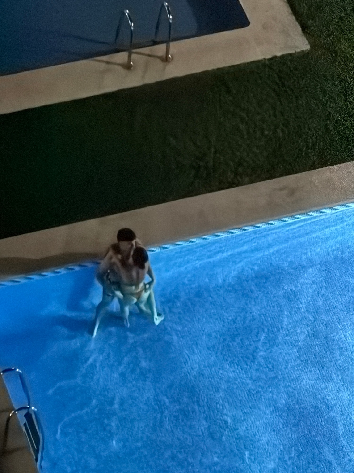 Late-night pool session, aerial and ground views
