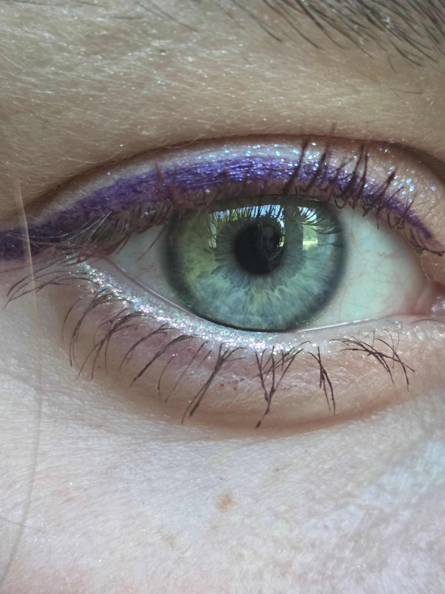 Purple Hues: Expressive Makeup in a Heartfelt Selfie
