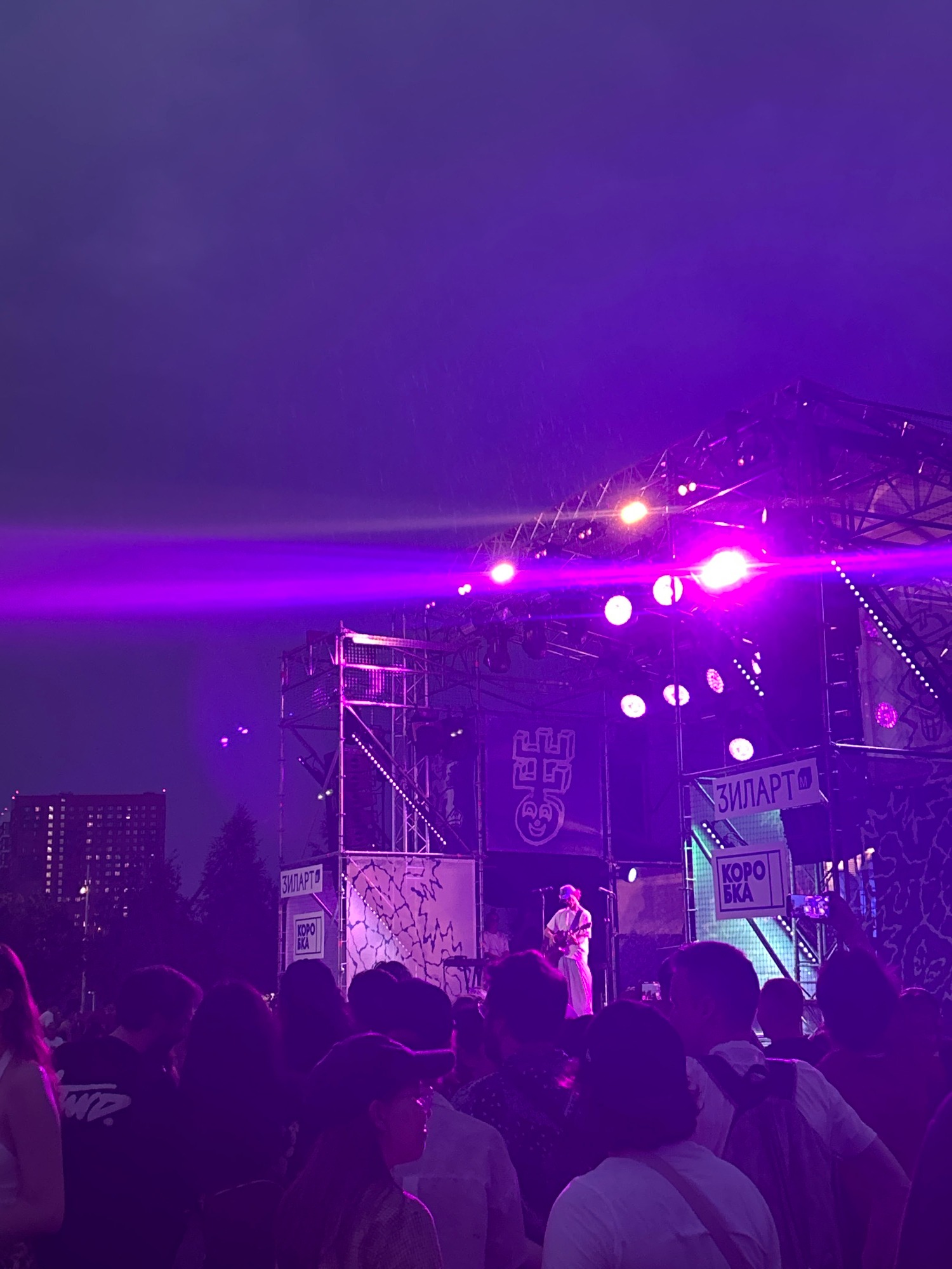 Live outdoor concert in an urban park at dusk