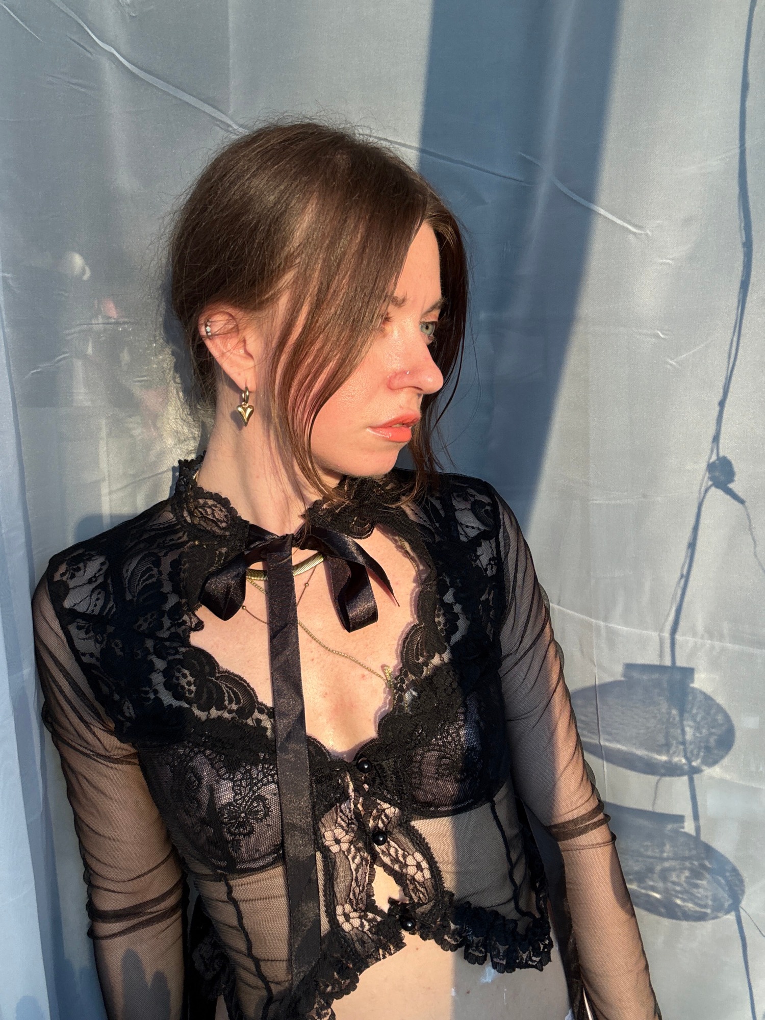 Portrait session in black lace top with gold jewelry