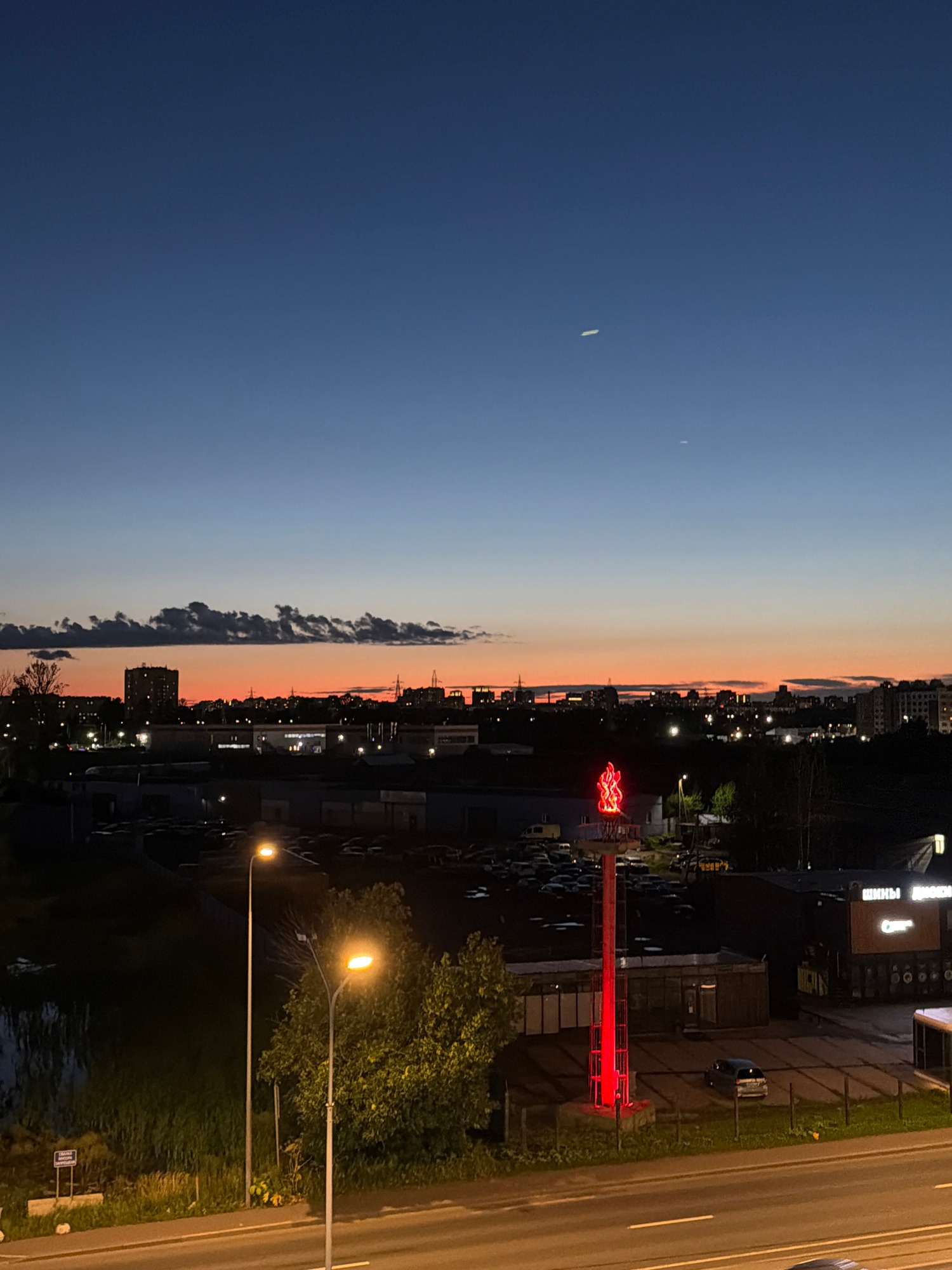City skyline at dusk, blue hour fading into sunset