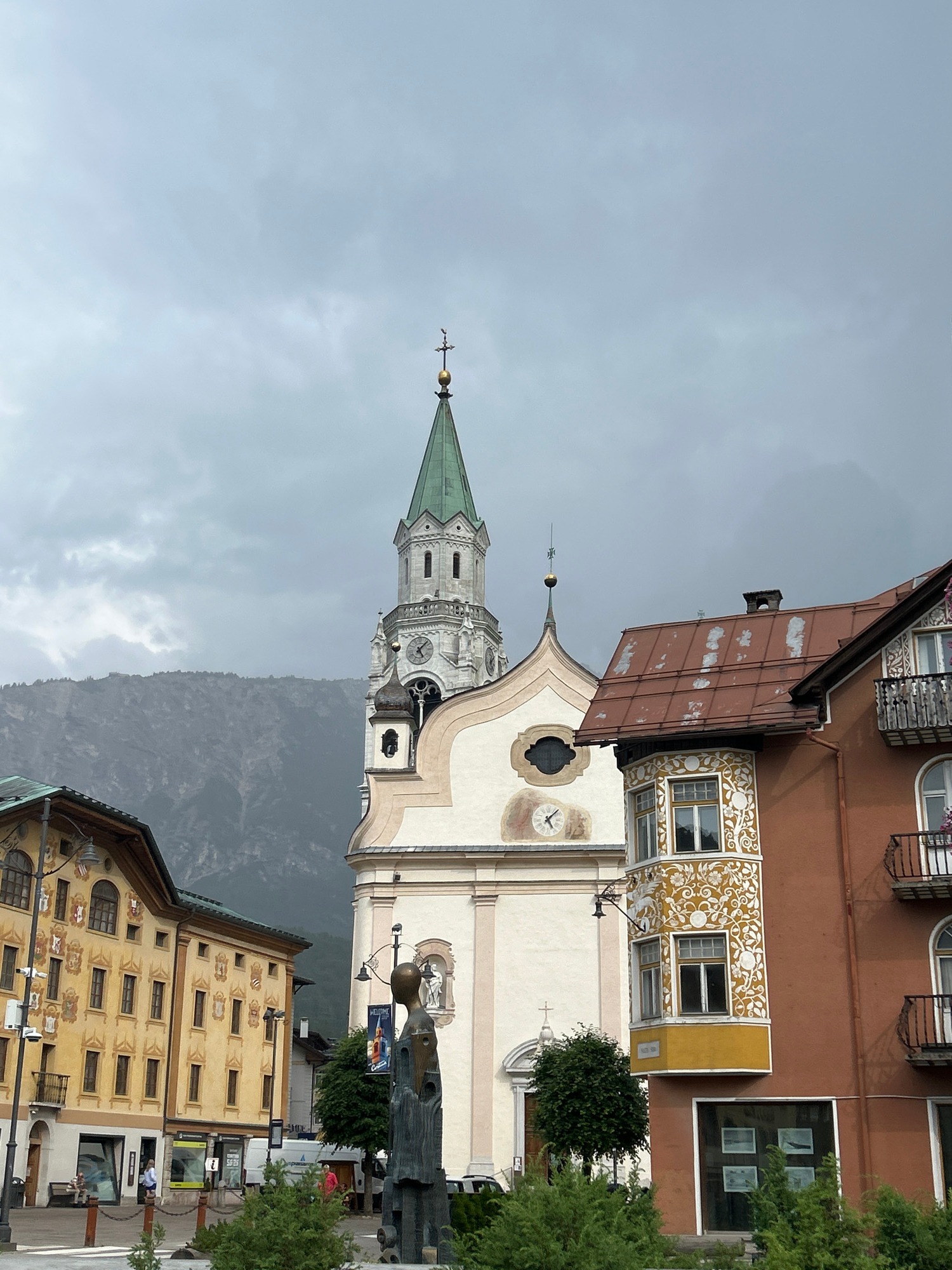 Alpine town buzz: streets, crowds, and Olympic rings