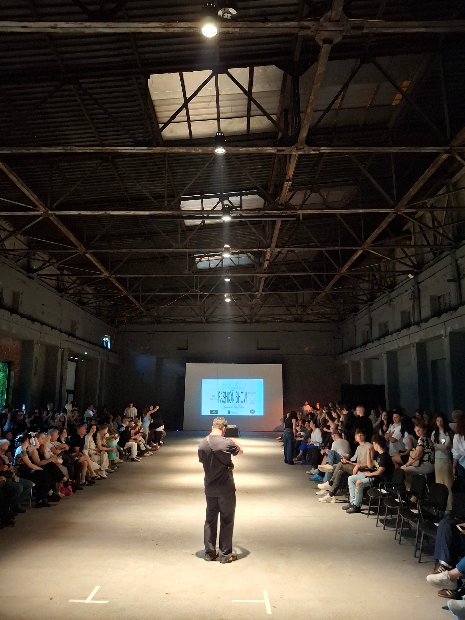 Industrial Metamorphosis: How Raw Warehouses Are Redefining Modern Fashion Runway Shows