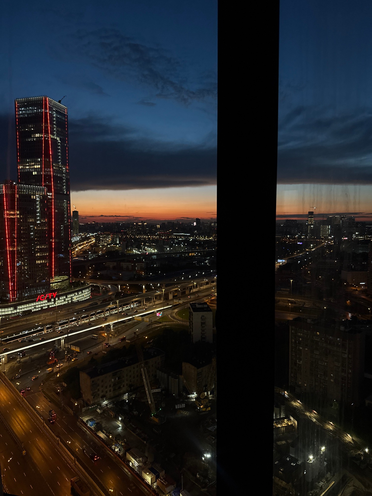 City skyline at dusk, multiple aerial angles