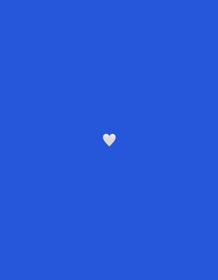 A single, small, white heart icon is centered on a solid blue background. The icon appears to be a digital rendering. There is no discernible environmental context or location information available.