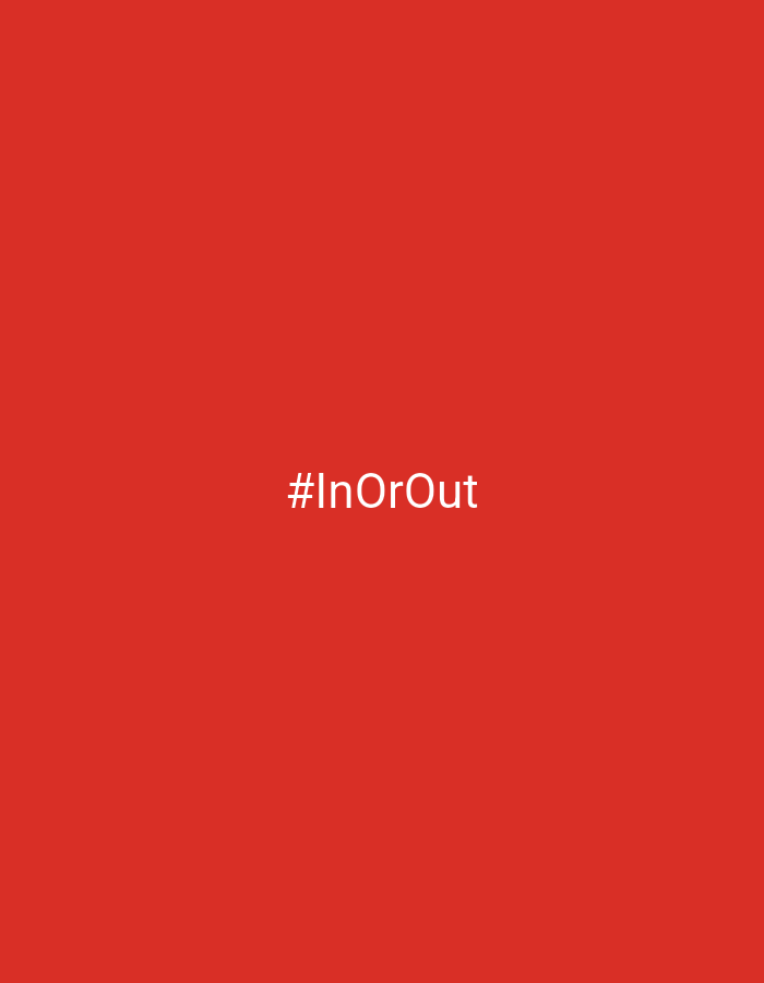 The image is a solid red background with the white text "#InOrOut" centered horizontally and located in the lower middle portion of the frame. There are no people, objects, actions, interactions, or environmental details present in the image, nor is there any information indicating a location in Lhokseumawe, Indonesia.