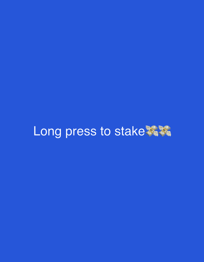The image is a close-up, vertically oriented, indoor shot against a solid blue background. Centered horizontally and positioned in the lower portion of the frame is the text "Long press to stake" in white font. To the right of the text are three emojis depicting stacks of money with wings. There are no people or identifiable objects from Bar Jirgi Summa, Nigeria, in the image.
