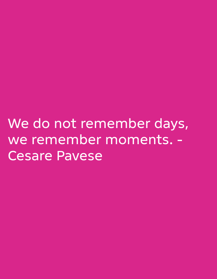 A quote attributed to Cesare Pavese is displayed in white text on a solid pink background. The quote reads: "We do not remember days, we remember moments. - Cesare Pavese". The text is centrally aligned and occupies the lower portion of the image.