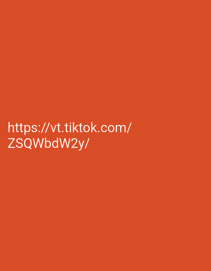 The image displays white text on an orange background. The text reads "https://vt.tiktok.com/" on the first line and "ZSQWbdW2y/" on the second line. There is no information about the city of Jos, Nigeria, or any forensic details in the image.