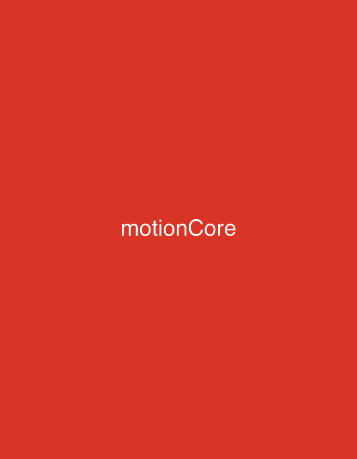 The image is a plain red background with the white text "motionCore" centered horizontally and positioned slightly above the vertical center. The text appears to be a brand name or a title. There are no other objects, people, or environmental details visible in the image. There is no information to suggest the image is located in a specific city or country.