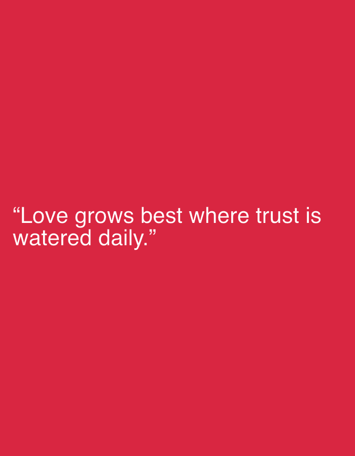 The image displays a white text quote on a solid red background. The quote reads: "Love grows best where trust is watered daily." There are no people, objects, actions, interactions, or environmental elements depicted in the image, other than the text and background. The image does not contain any information that could link it to Jalingo, Nigeria, or any other specific location.