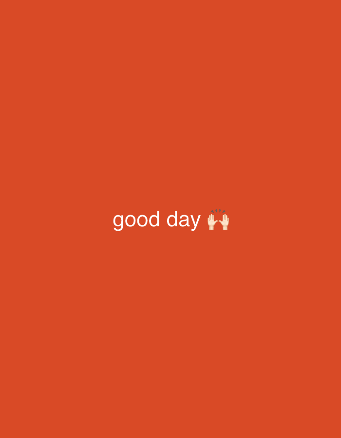 The media file is a simple, minimalist image with a plain orange background. Centered in the lower portion of the image is the text "good day" in white, sans-serif font. To the right of the text, there are two emoji hands, also in white. These hands appear to be in a celebratory or congratulatory gesture, with small, light-colored sparkle or starburst graphics emanating from between them. The overall presentation is clean and direct, with no discernible background elements or environmental context to suggest a specific time of day, weather, or location beyond what might be inferred from the text and emojis. The emotion conveyed is positive and friendly. There is no other discernible activity or event taking place.