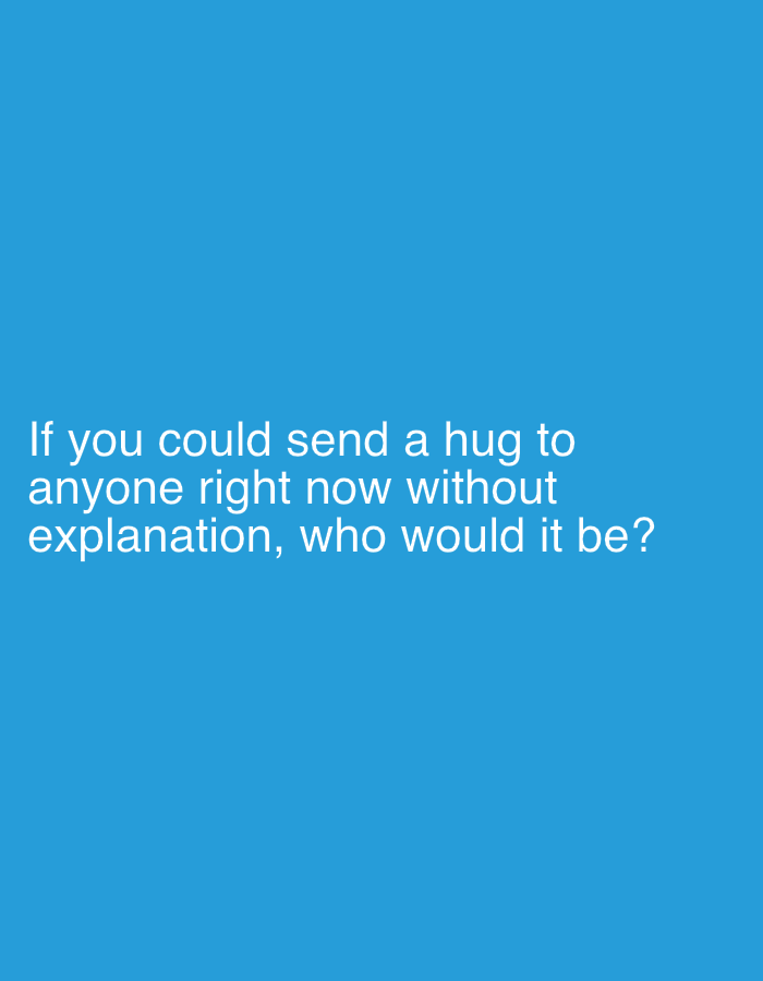 The image is a digital graphic with white text on a solid blue background. The text reads: "If you could send a hug to anyone right now without explanation, who would it be?" There are no people, objects, or discernible environmental features present in the image. The location in Sergeevo, Russia is not depicted.