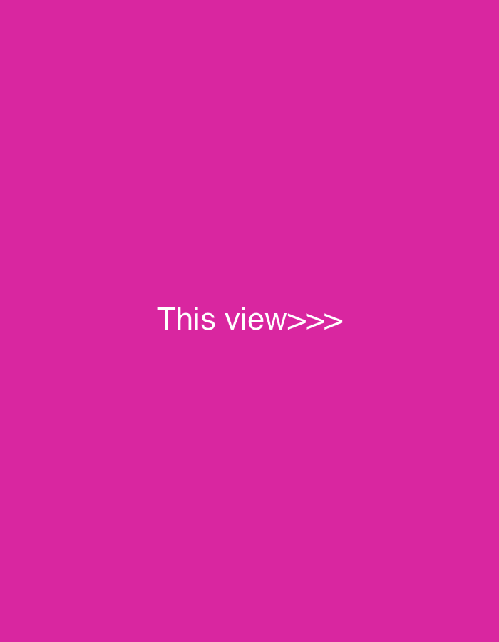 The image is a plain pink background with white text that reads "This view>>>". There are no people, subjects, objects, or actions depicted in the image. The location in the city of Jalingo, Nigeria is not specified or relevant to the content of the image.