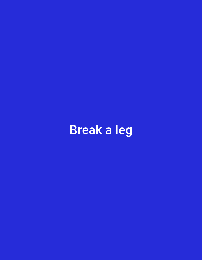 The image displays white text that reads "Break a leg" centered on a solid blue background. There is no discernible location within the city of Homyel, Belarus, as the image contains only text and a uniform color. The image is a static composition with no people, subjects, objects, actions, or interactions to describe.