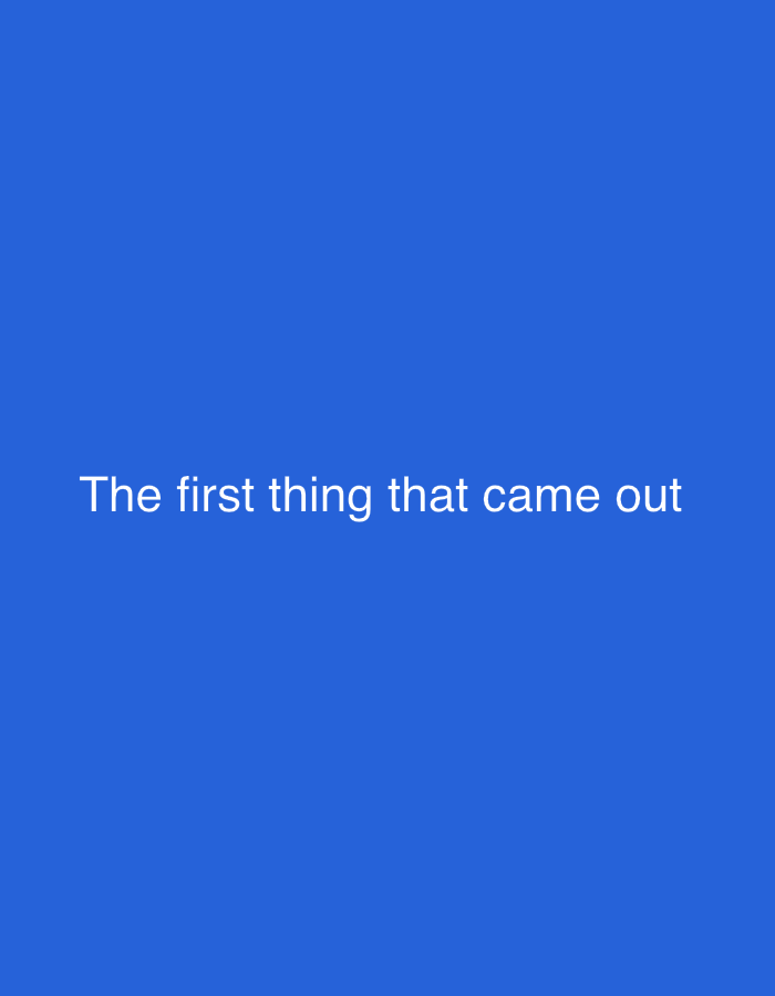 The image is a plain blue background with white text centered on it. The text reads: "The first thing that came out". There is no discernible location within the city of Lobosh, Bulgaria, nor are there any people, subjects, objects, actions, or interactions depicted.