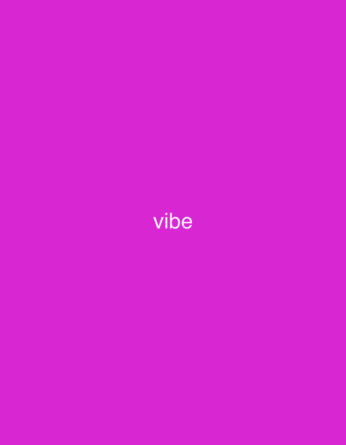 The image displays the word "vibe" in white, capitalized text centered on a solid magenta background. The image is an indoor shot. The scene does not contain any elements that would indicate a specific location in Yerevan, Armenia.