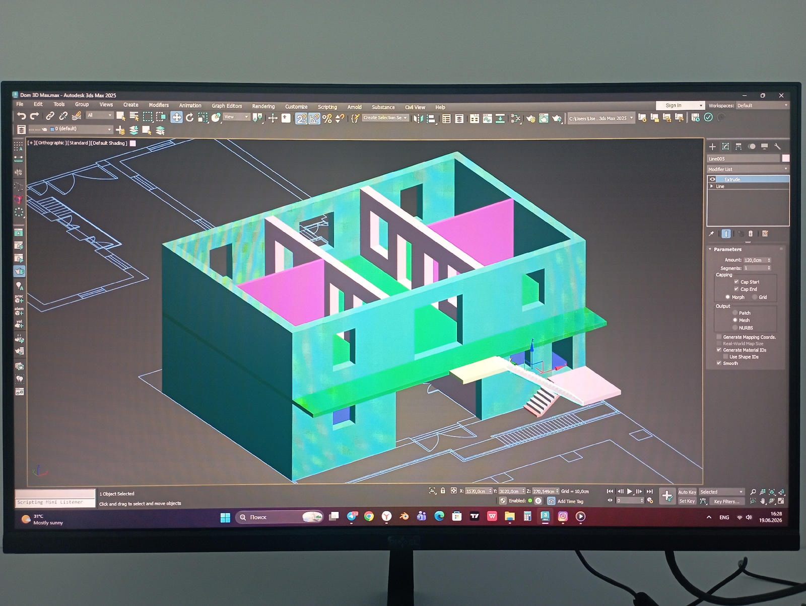 The image shows a computer monitor displaying 3D modeling software, specifically Autodesk 3ds Max 2025. The software is being used to design a three-story building with a teal and pink color scheme. The building appears to be a residential structure with visible windows, doors, and a balcony with stairs. The background shows a blueprint or floor plan overlaying a grid, indicating the design is in progress. Various toolbars and menus of the software are visible on the screen, including file operations, editing tools, object properties, and rendering options. A taskbar at the bottom of the screen displays system information such as time, date, and open applications, including a search bar and icons for web browsers and other software. There are no people or environmental details outside of the computer screen in the image.