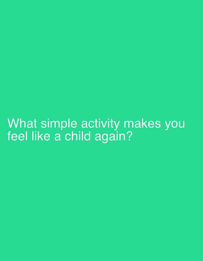 The image is a plain, bright green background with white text. The text reads, "What simple activity makes you feel like a child again?". There are no other objects or subjects present in the image. There is no information about the location of Sergeevo, Russia.