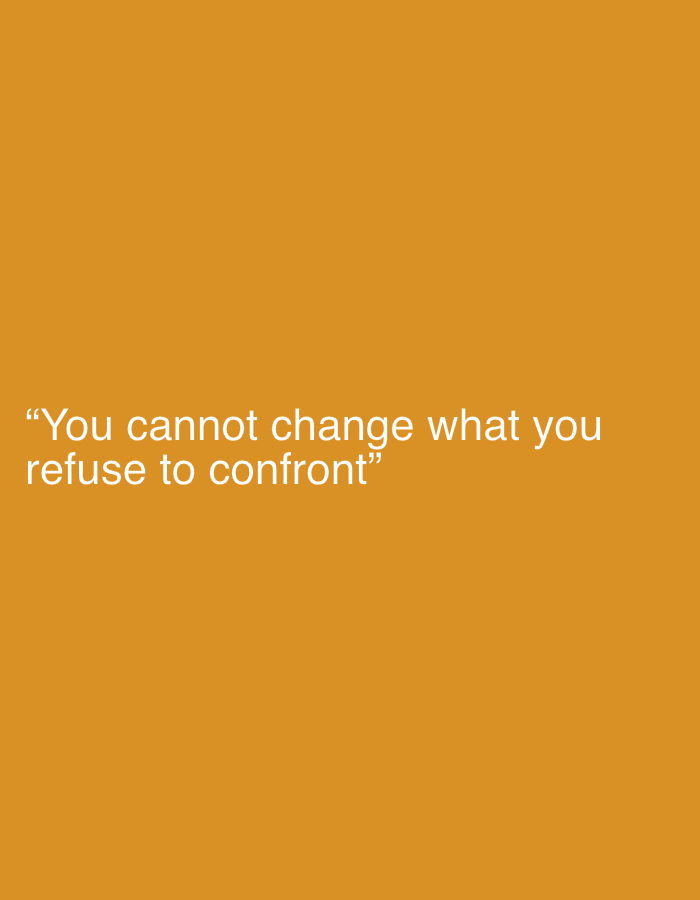 A quote is superimposed on a solid orange background. The quote reads, "You cannot change what you refuse to confront". There are no people, objects, or environmental details present in the image that would allow for a location in Malé, Maldives, or any other city.