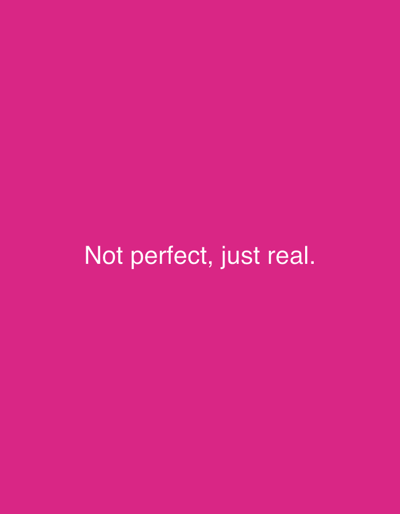 The scene, presented as a static digital graphic, is designated within the context of the city of Zango-ndaji, Nigeria. The image displays a uniform magenta background (approximate hexadecimal color #E00078). Centered horizontally and positioned in the lower-middle vertical section of the frame is a single line of white, sans-serif text. The text reads, "Not perfect, just real." No human subjects, animals, physical objects beyond the digital display, observable actions, or external environmental details are depicted within the image frame.