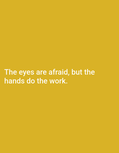 The image is a plain yellow background with white text. The text reads "The eyes are afraid, but the hands do the work." There is no discernible location in the city of Kaliningrad, Russia, or any people, subjects, objects, actions, or interactions.